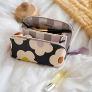 caroline-gardner-multi-flower-diagonal-wash-bag---blackcream-35903974