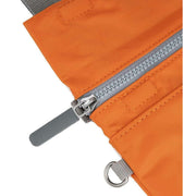 Roka Stratford Recycled Nylon Sling Bag - Burnt Orange