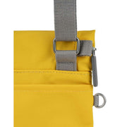 Roka Stratford Recycled Nylon Sling Bag - Mustard Yellow